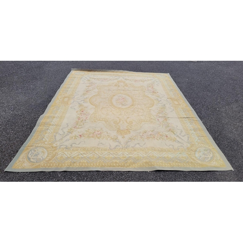 108 - A GOOD QUALITY WOVEN AUBUSSON FLOOR RUG, with a central medallion with floral bouquet, the main body... 