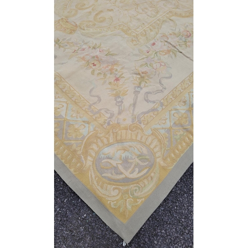 108 - A GOOD QUALITY WOVEN AUBUSSON FLOOR RUG, with a central medallion with floral bouquet, the main body... 