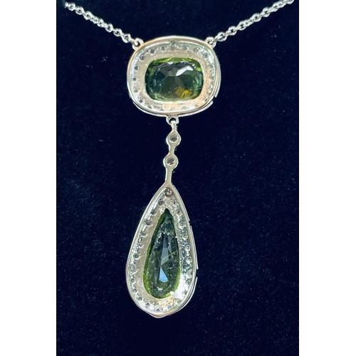 11 - A BEAUTIFUL ART NOUVEAU 18CT WHITE GOLD PERIDOT & DIAMOND PENDANT, a fantastic piece of jewellery cr... 