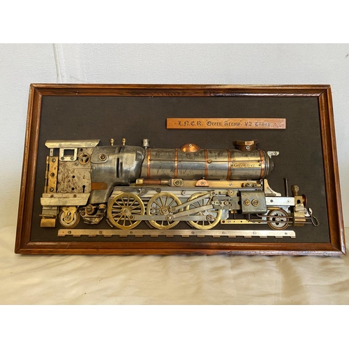 122 - A HANDMADE MOUNTED MODEL OF THE GREEN ARROW TRAIN ENGINE, the detailed model is created out of parts... 