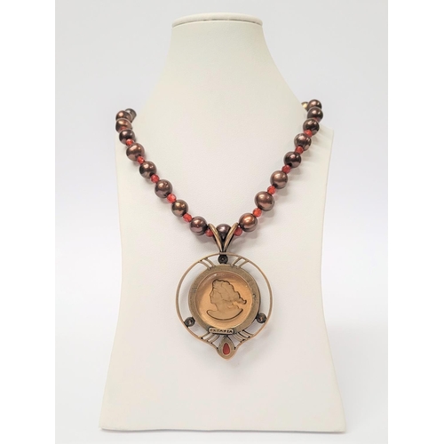 129 - AN EXTASIA GERMAN GLASS INTAGLIO NECKLACE, the pendant with light brown glass intaglio to the centre... 