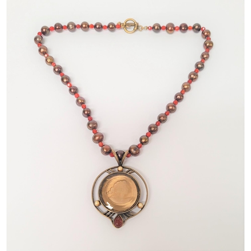 129 - AN EXTASIA GERMAN GLASS INTAGLIO NECKLACE, the pendant with light brown glass intaglio to the centre... 