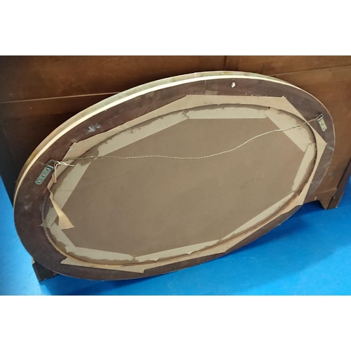 173 - A VERY GOOD QUALITY GILT OVAL SHAPED WALL MIRROR, would work well in a hallway, or over a mantle pla... 