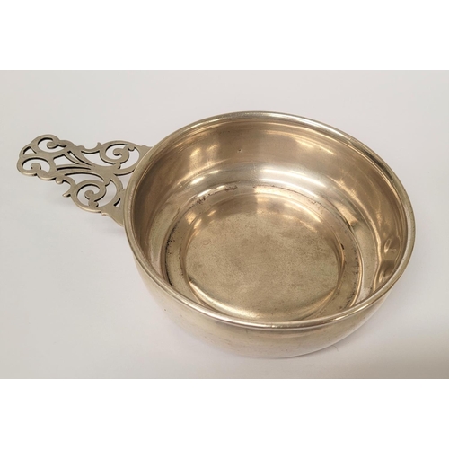 185 - A STERLING SILVER PORRINGER BOWL, with pierced handle decorated with scroll design. Marked Sterling ... 