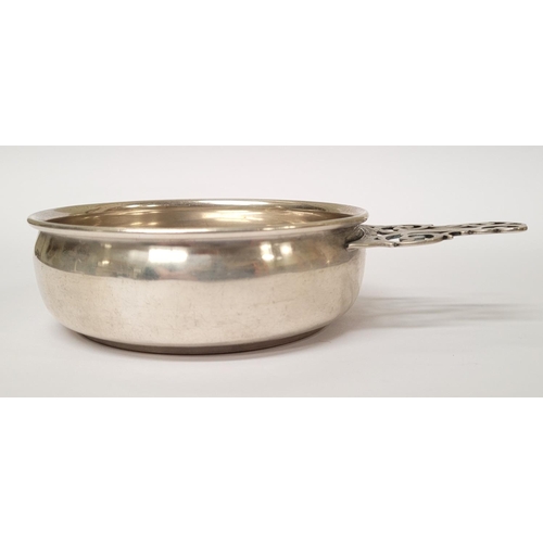 185 - A STERLING SILVER PORRINGER BOWL, with pierced handle decorated with scroll design. Marked Sterling ... 