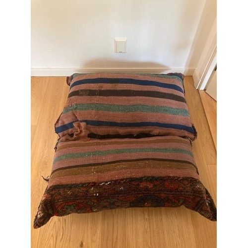 200 - A DOUBLE PERSIAN CUSHION, the cushions are tied together with each half measuring 110cm x 70cm, deco... 