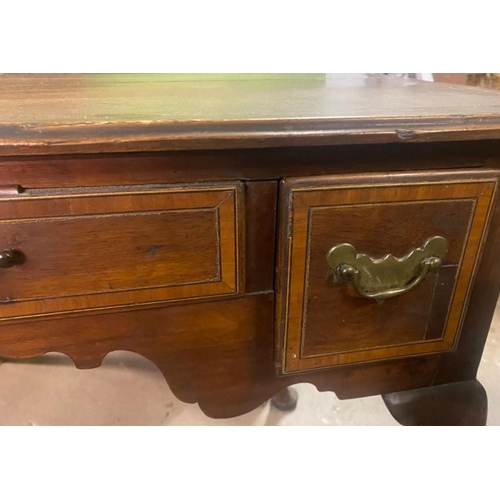 239 - AN 18TH CENTURY MAHOGANY CROSS-BANDED THREE DRAWER DESK / SIDE TABLE, the panelled top sits over thr... 