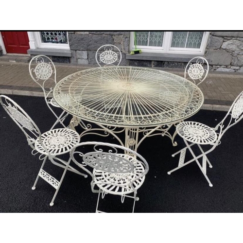 241 - A GOOD QUALITY FRENCH GARDEN DINING SUITE; includes a circular glass topped table, with 6 chairs. Th... 