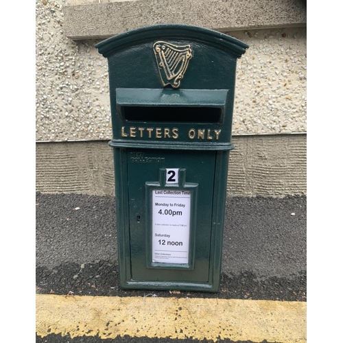 244 - A GREEN IRISH POST BOX, with gilt harp and lettering to the front. Dimensions: H 25 inches x W 10 in... 