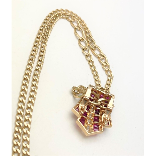 29 - AN INCREDIBLE 14CT SOLID GOLD RUBY & DIAMOND STATEMENT PENDANT & CHAIN, the pendant is made up of ba... 