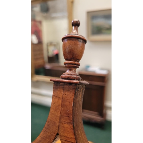 33 - A VERY FINE GEORGE III ROSEWOOD / MAHOGANY SKELETON DRESSING MIRROR, circa 1795, the oval shaped swi... 