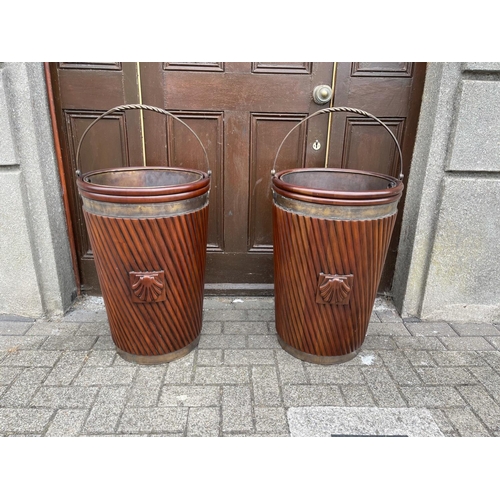 34 - A VERY FINE PAIR OF IRISH MAHOGANY BRASS BOUND PEAT BUCKETS, each with liner & typical Irish design ... 