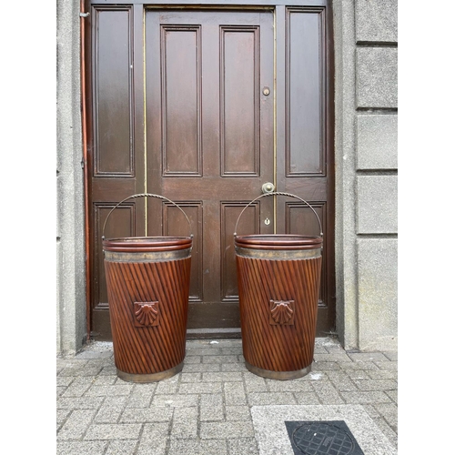 34 - A VERY FINE PAIR OF IRISH MAHOGANY BRASS BOUND PEAT BUCKETS, each with liner & typical Irish design ... 