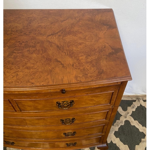 37 - A VERY GOOD BOW FRONTED FIGURED BURR WALNUT CHEST, with a narrow brush slide to the top over an arra... 