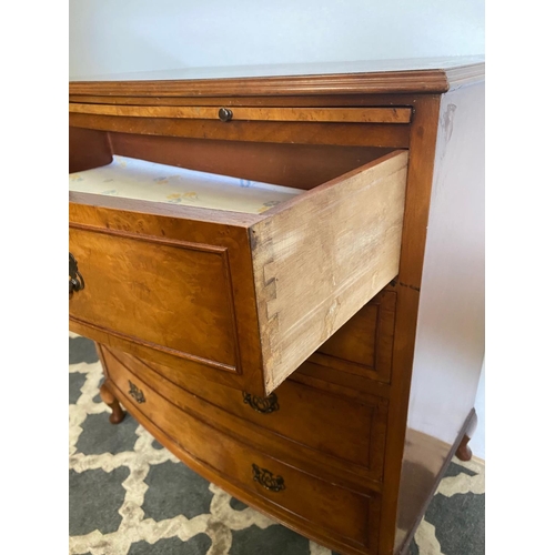 37 - A VERY GOOD BOW FRONTED FIGURED BURR WALNUT CHEST, with a narrow brush slide to the top over an arra... 