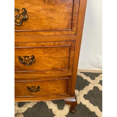 37 - A VERY GOOD BOW FRONTED FIGURED BURR WALNUT CHEST, with a narrow brush slide to the top over an arra... 