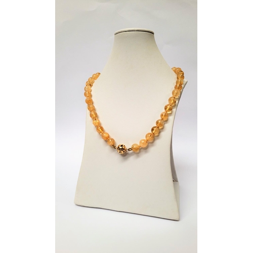 39 - A VERY PRETTY 9CT YELLOW GOLD & CRYSTAL BEAD NECKLACE, the clasp with scroll open work marked 375. T... 