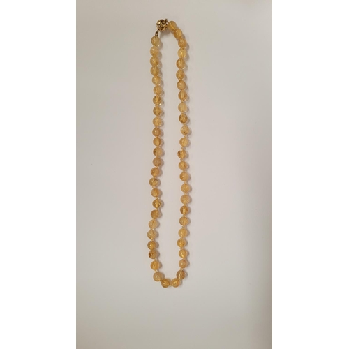 39 - A VERY PRETTY 9CT YELLOW GOLD & CRYSTAL BEAD NECKLACE, the clasp with scroll open work marked 375. T... 