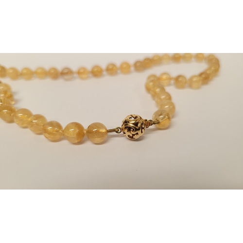 39 - A VERY PRETTY 9CT YELLOW GOLD & CRYSTAL BEAD NECKLACE, the clasp with scroll open work marked 375. T... 