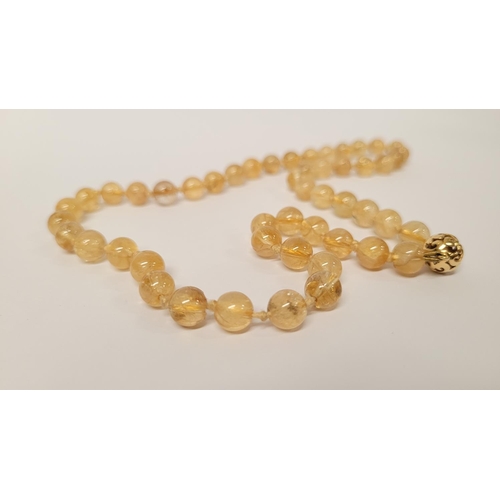 39 - A VERY PRETTY 9CT YELLOW GOLD & CRYSTAL BEAD NECKLACE, the clasp with scroll open work marked 375. T... 