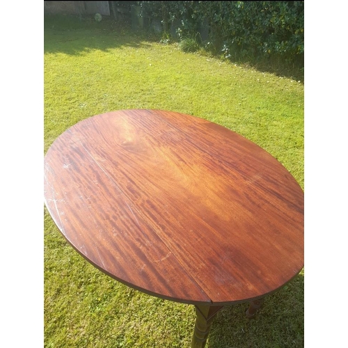 49 - A VERY GOOD QUALITY IRISH MAHOGANY DROP LEAF PEMBROKE TABLE, with oval shape to the top when leaves ... 