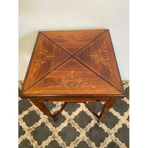 57 - A FINE ROSEWOOD INLAID ENVELOPE CARD TABLE, with decorative inlaid detail to the four envelope leave... 