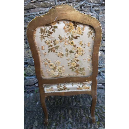 72 - AN ANTIQUE FRENCH GILTWOOD ARMCHAIR, with shell and scrolling floral detail to the crest rail, with ... 