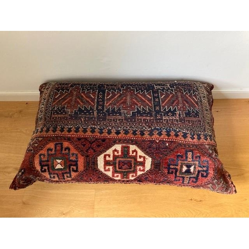 75 - A GOOD QUALITY PERSIAN RUG CUSHION, this handwoven cushion was purchased by the current owner in Teh... 