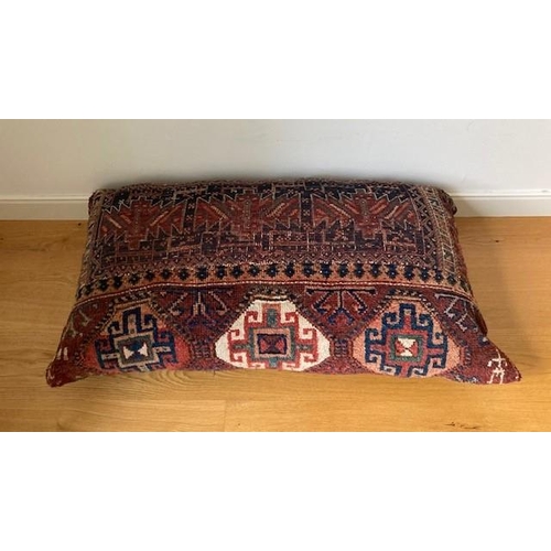 76 - A LARGE GOOD QUALITY PERSIAN RUG CUSHION, a handwoven cushion which was purchased by the current own... 