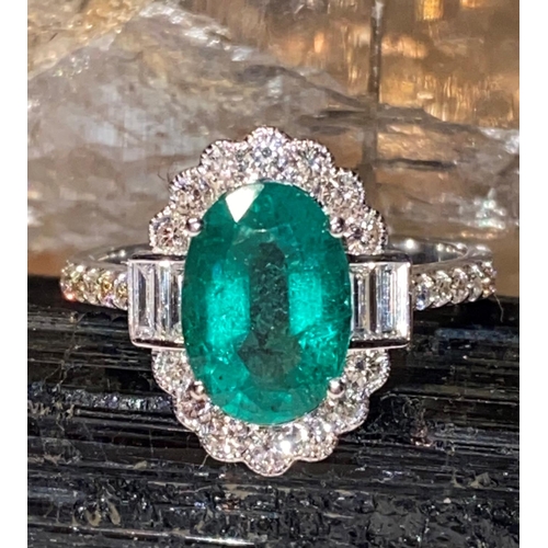 9 - A BEAUTIFUL 18CT WHITE GOLD COLOMBIAN EMERALD & DIAMOND CLUSTER RING, the Emerald is a 2.40cts and s... 