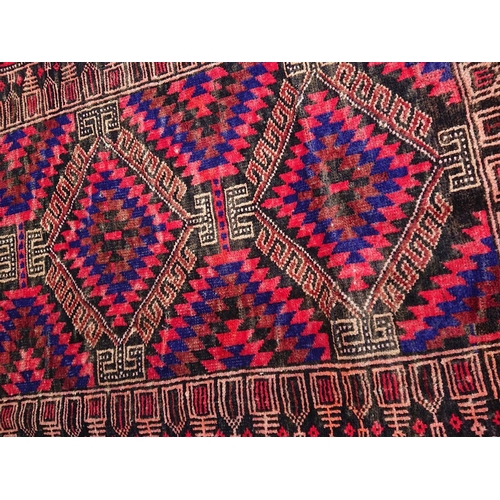 101 - A VIBRANT PERSIAN BELOUCH RUG, material: hand spun wool with natural organic dyes; design: this rug ... 