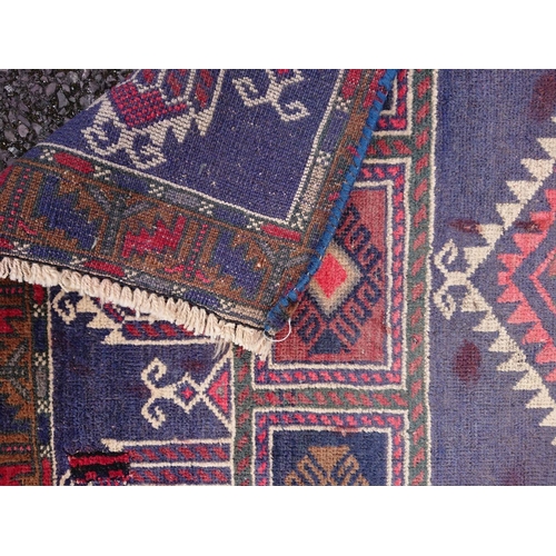 102 - AN AFGHAN PRAYER BELOUCH RUG, material: hand spun wool with natural organic dyes; design: this rug f... 