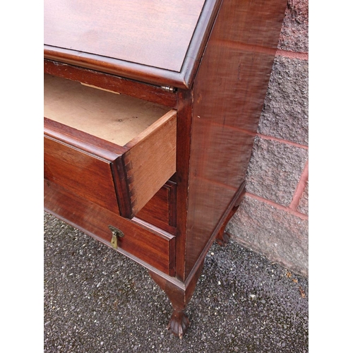 123 - A MAHOGANY WRITING BUREAU, lift top opening to fitted interior, above three drawers with brass drop ... 