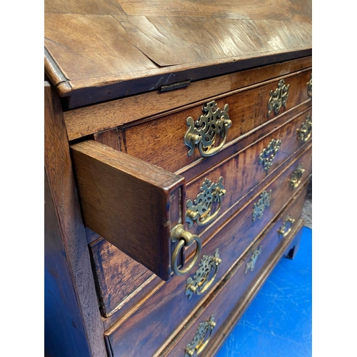 125 - A 19TH CENTURY BURR WALNUT WRITING BUREAU, with brass handles, fall front opening to fitted interior... 