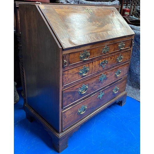 125 - A 19TH CENTURY BURR WALNUT WRITING BUREAU, with brass handles, fall front opening to fitted interior... 
