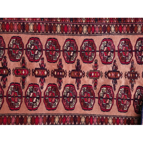 14 - A UNIQUE AFGHAN TURKMAN RUG, material: hand spun wool with natural organic dyes; design: this rug fe... 