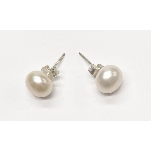 158 - A CLASSIC PAIR OF CULTURED PEARL STUD EARRINGS, beautiful cultured pearls with silver backs, marked ... 