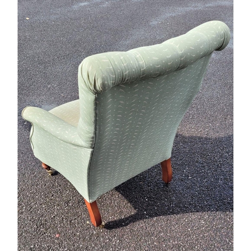 159 - A GOOD QUALITY 'SUSIE WATSON' BUTTON BACKED ARM CHAIR, with bow front shape, raised on tapered turne... 