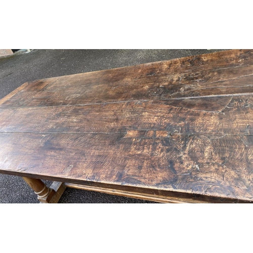 164 - AN 18TH CENTURY MAHOGANY REFECTORY TABLE, with carved supports to pedestal base with cross stretcher... 