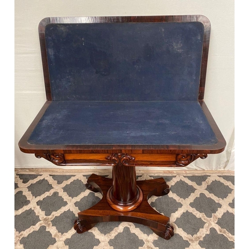 20 - A WILLIAM IV ROSEWOOD CARD TABLE with carved scroll detail to front, deep blue baize to interior, su... 