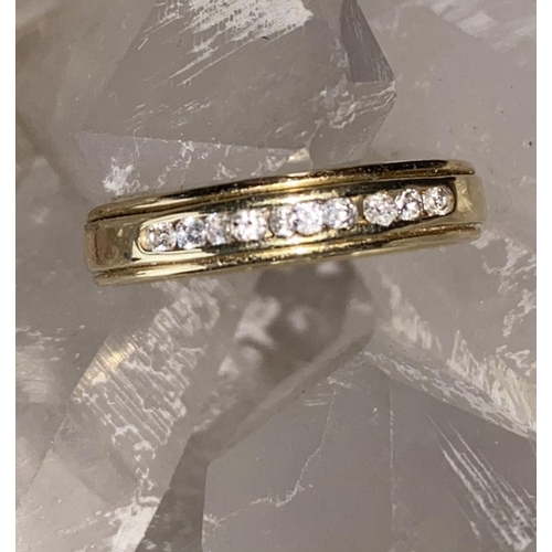 21 - A LOVELY 18CT YELLOW GOLD CHANEL SET DIAMOND BAND RING, channel set brilliant cut diamonds weigh 1.0... 