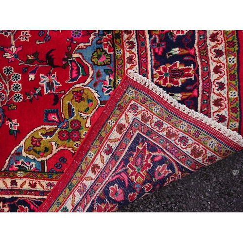 25 - A LARGE KASHAN PERSIAN RUG, material: hand spun wool with natural organic dyes; design: this rug fea... 