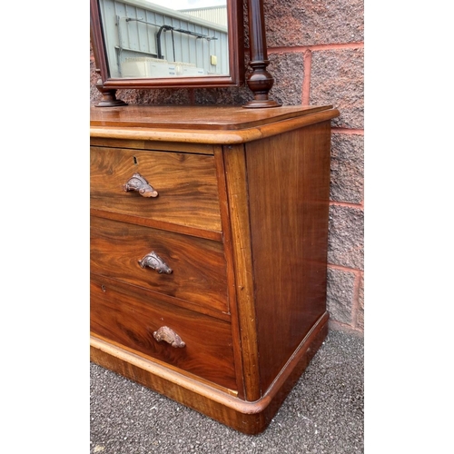 27 - A 19TH CENTURY MAHOGANY VANITY DRESSING TABLE, with arched swing mirror on turned supports, four dra... 