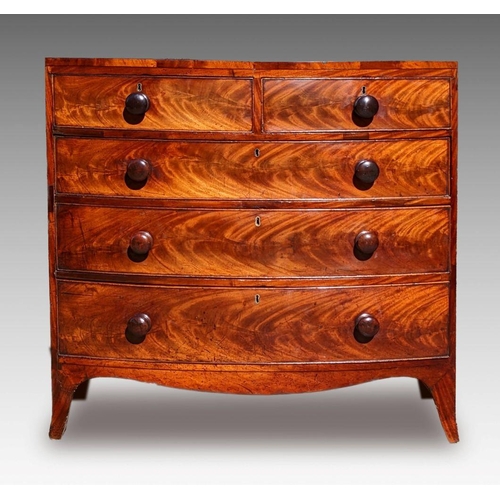 3 - A GEORGIAN MAHOGANY BOW FRONTED CHEST OF DRAWERS, c.1800, with beautifully patinated flame mahogany ... 