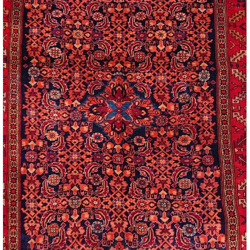 35 - A VIBRANT PERSIAN RUG, material: hand spun wool with natural organic dyes; design: this rug features... 