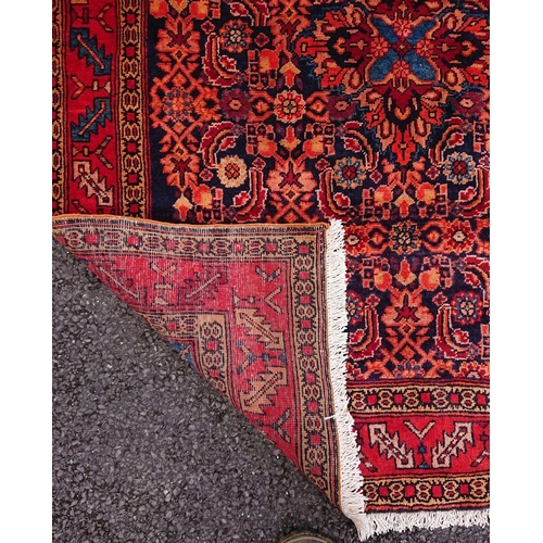 35 - A VIBRANT PERSIAN RUG, material: hand spun wool with natural organic dyes; design: this rug features... 