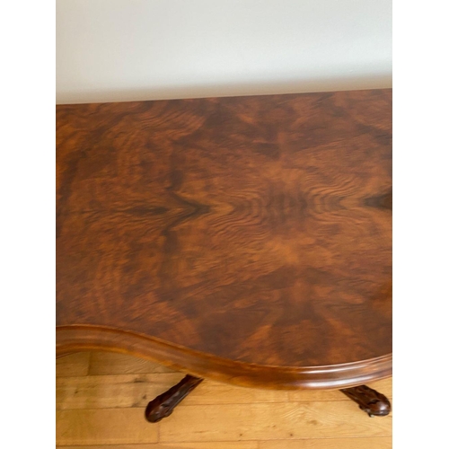 38 - A VICTORIAN BURR WALNUT CARD TABLE, with serpentine front, with green baize to interior, standing on... 