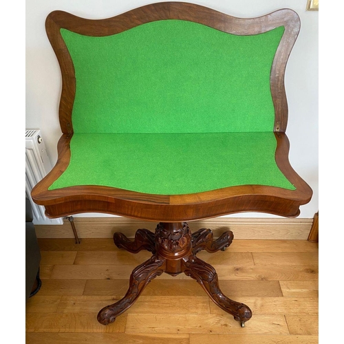 38 - A VICTORIAN BURR WALNUT CARD TABLE, with serpentine front, with green baize to interior, standing on... 