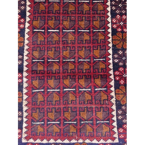 42 - AN AFGHAN BALUCHI PRAYER RUG, material: hand spun wool with natural organic dyes; design: this rug f... 