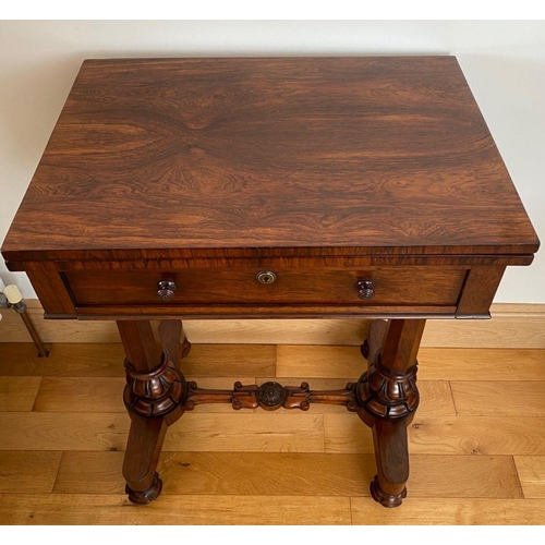 48 - A WILLIAM IV ROSEWOOD GAMES TABLE, with draught board to interior, standing on column legs supported... 